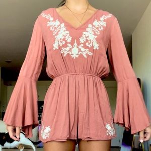 Altar’d State pink Romper with Flare sleeves and white embroidery